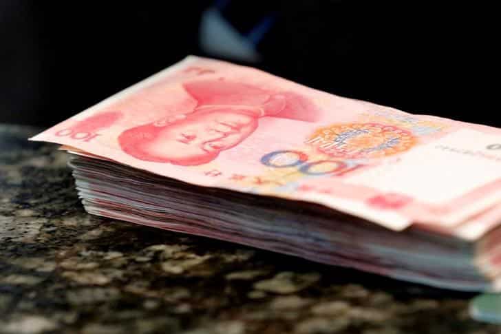 China banks extend record 12.65 trillion yuan in loans in 2016 as debt worries mount
