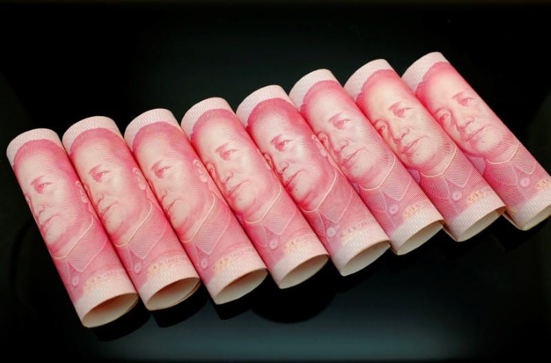 China's January forex reserves fall more than expected to $2.998 trillion, near 6-year low