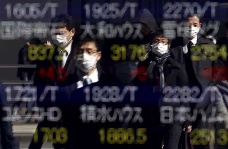 Asian shares off 1 1/2-year high, Trump's yuan comment in focus