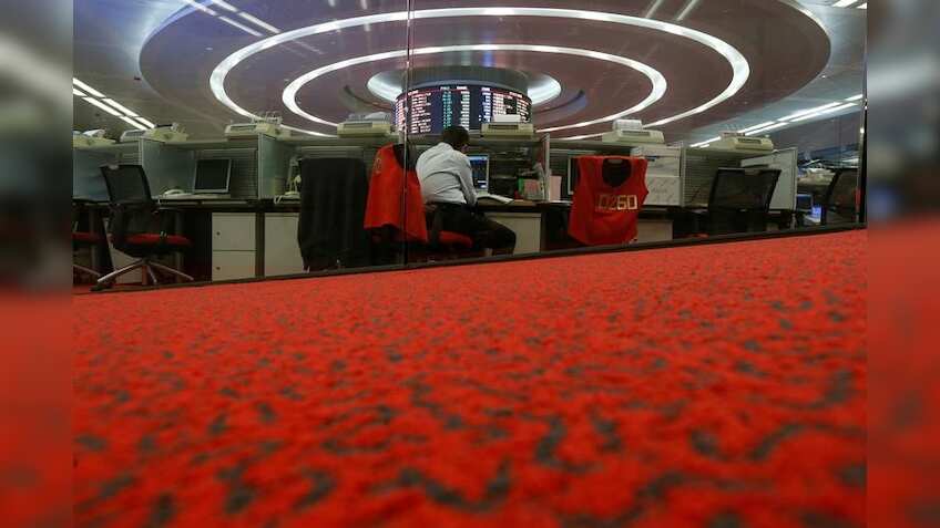 Asia stocks erase losses but some investors await Trump talk