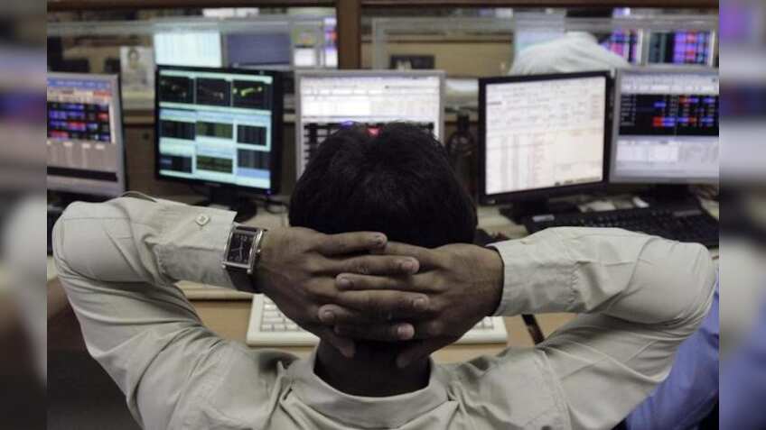 Sensex, Nifty open flat as investors remain cautious ahead of US Fed announcements