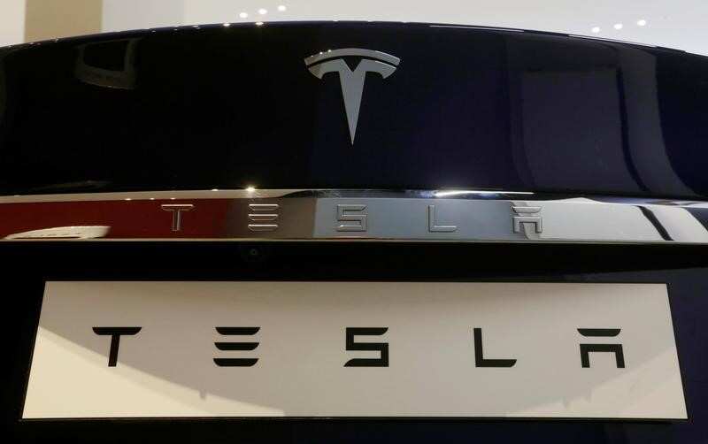 Tesla to raise about $1.15 billion in stock, notes; Musk to buy shares