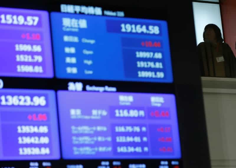 Asia stocks set to end week higher, dollar slides after Fed