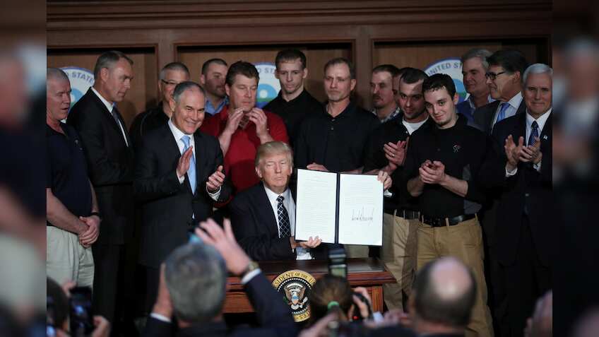 Trump signs order sweeping away Obama-era climate policies