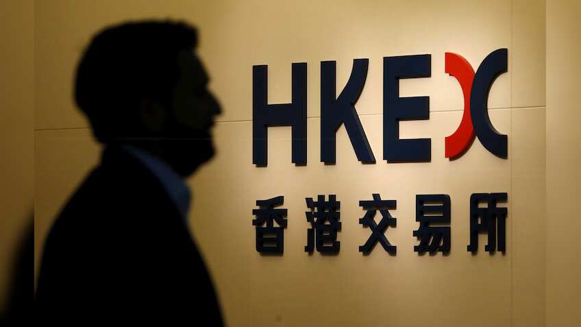 Asian shares retreat from highs after Trump tax plan