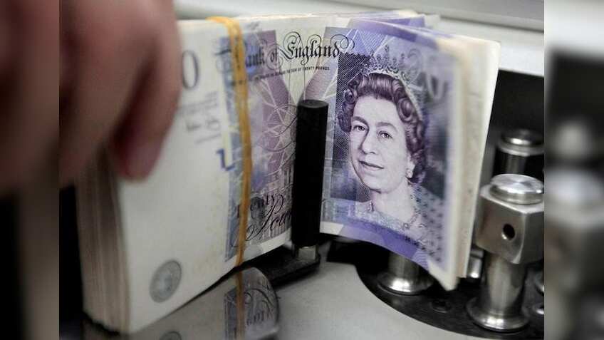 Sterling retreats after Manchester blast, stocks steady