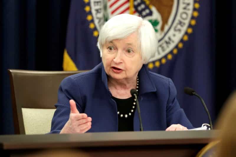 Fed raises rates, unveils cuts to bond holdings in sign of confidence