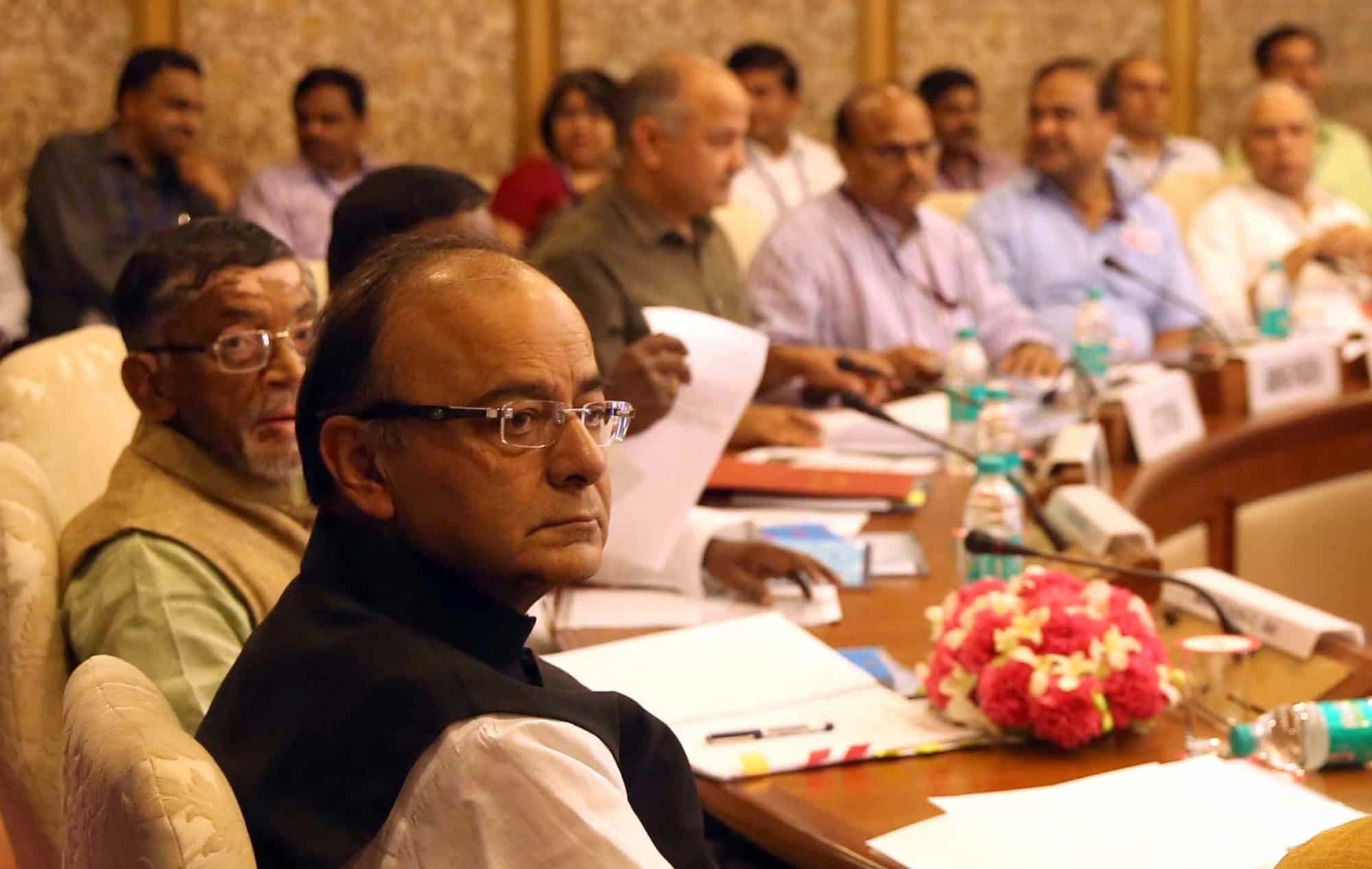 Cigarette makers drop as GST Council hikes cess; ITC biggest loser