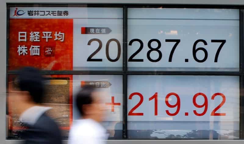 Asian shares edge up, bolstered by modest gains on Wall Street