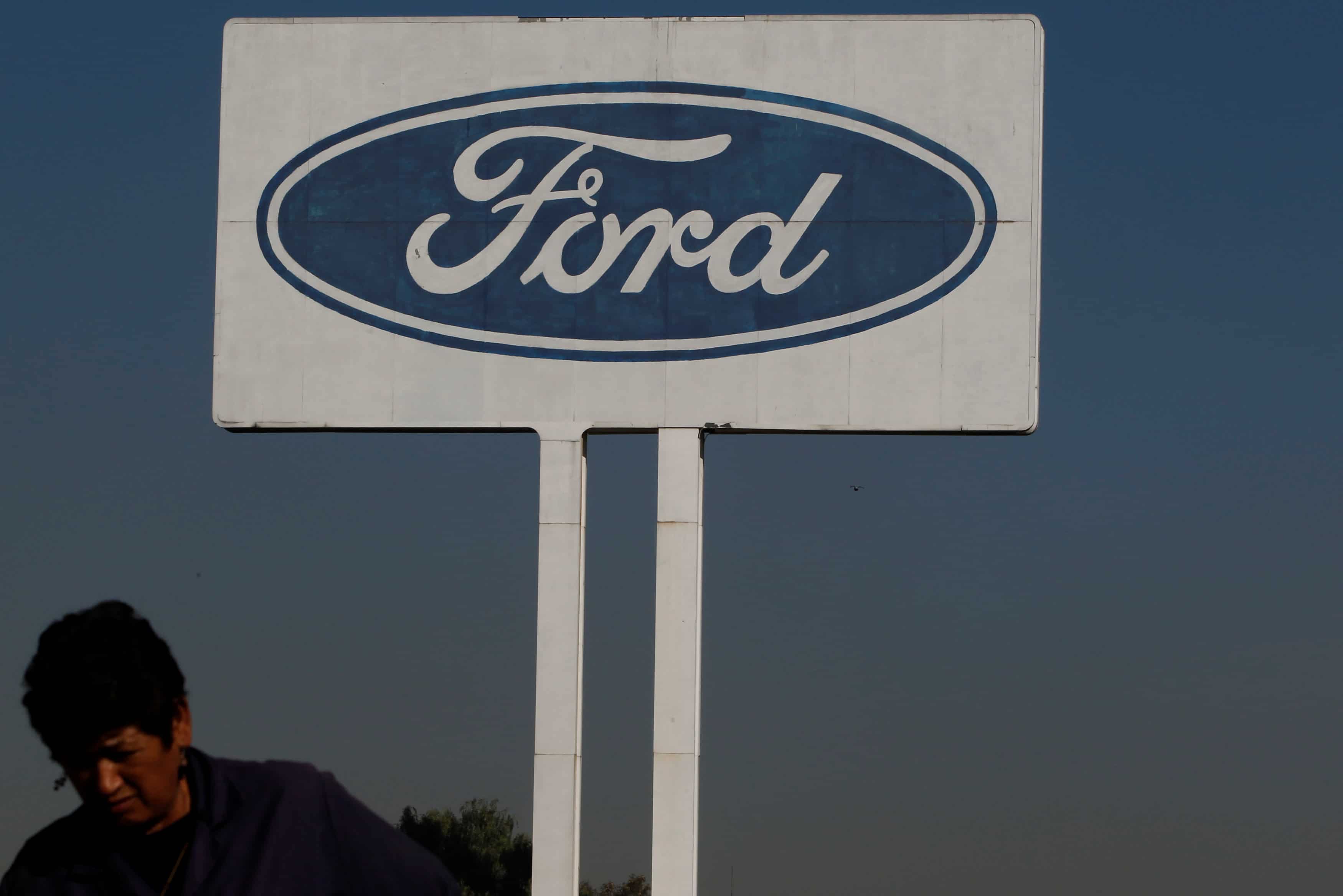 Ford to cut $14 billion in costs by investing in trucks, electric cars