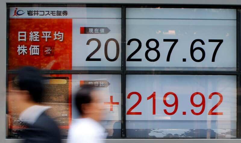 Asian markets shrug off Wall Street losses; tensions ease on Korea