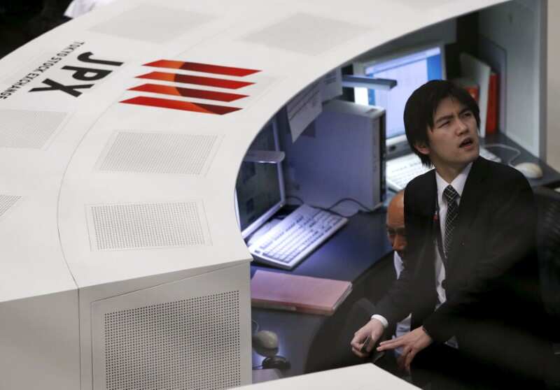 Asian markets hover near decade highs; investors eye China Congress