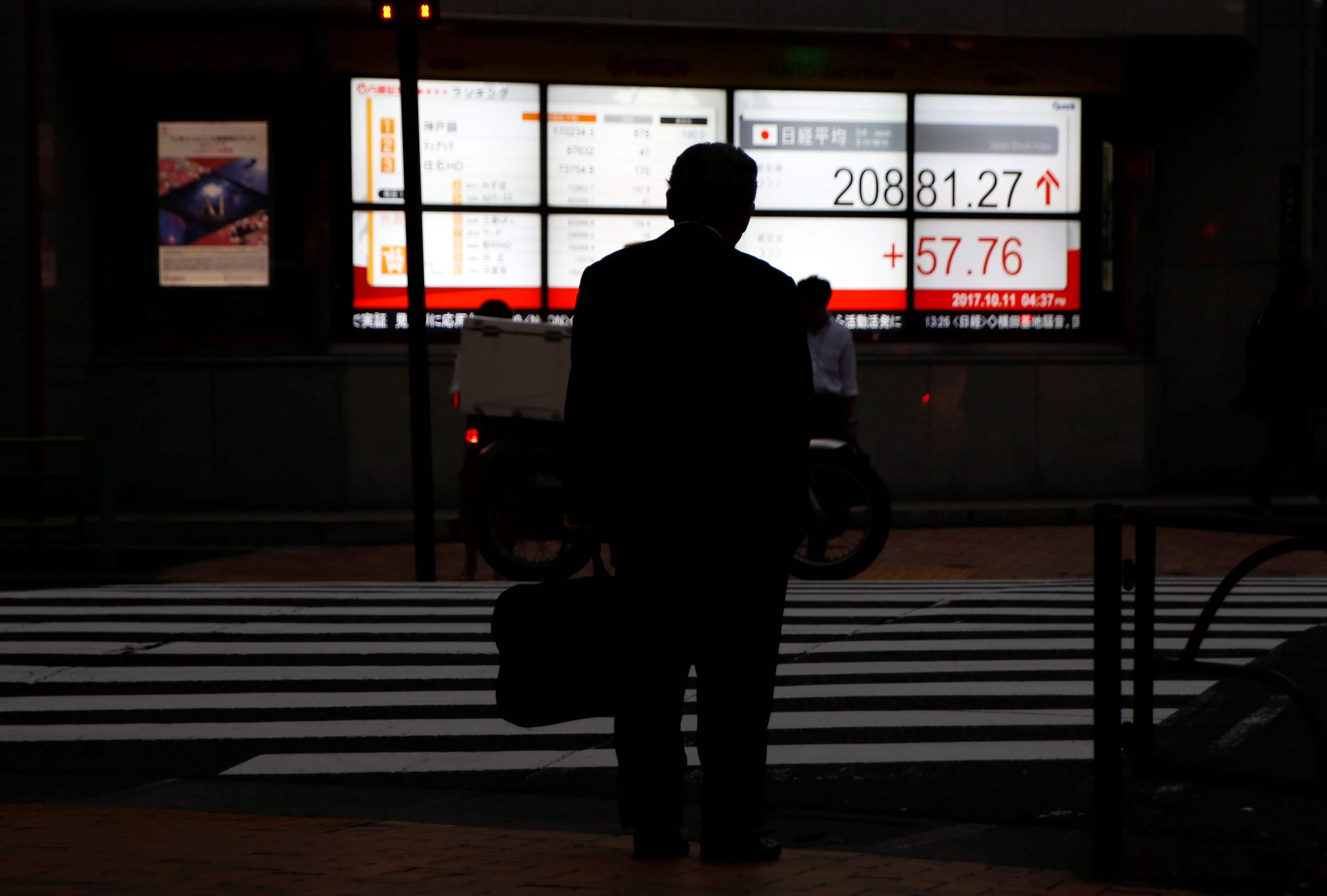 Asian markets gain on upbeat earnings from US tech giants