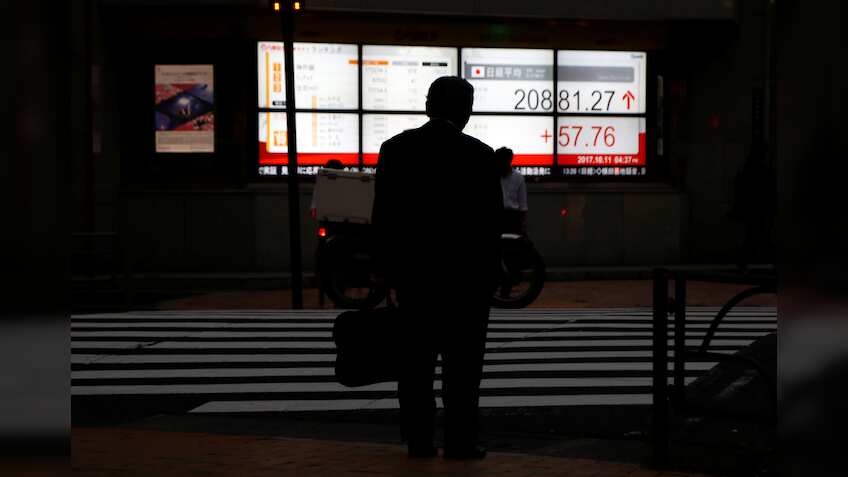 Asian markets gain on upbeat earnings from US tech giants