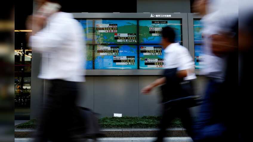 Global Markets: Asian shares gain as earnings, tax debate help U.S. stocks