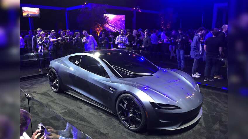 Tesla unveils electric big-rig truck, sporty Roadster