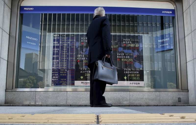 Asian shares edge up with U.S. tax bill in focus