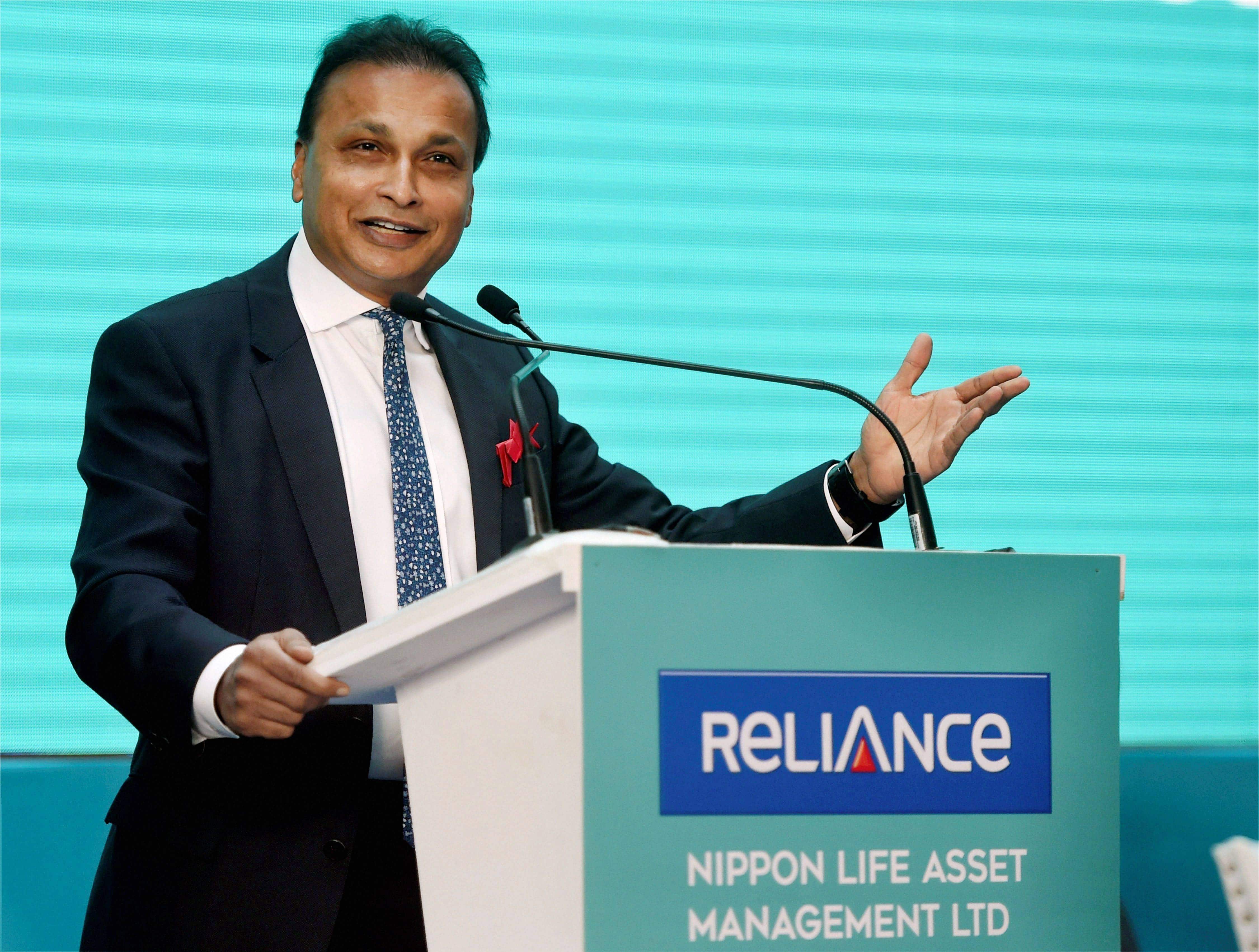 Anil Ambani speaks during the listing ceremony of Reliance Nippon AMC