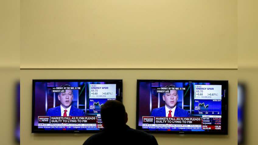 Global Markets: U.S. tax bill, Russian probe whipsaw financial markets