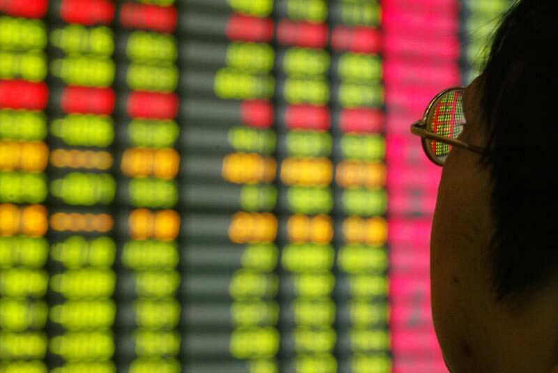 Asia stocks pressured by Wall Street losses, dollar sags