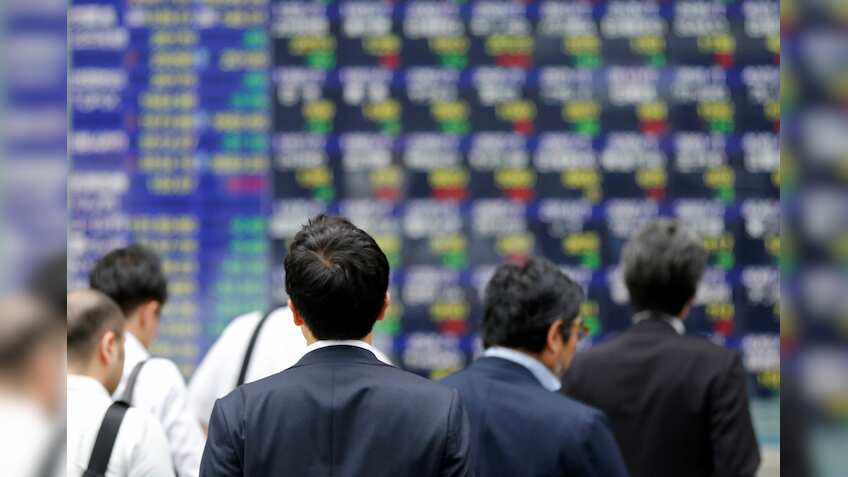 Asia shares hover near two-month low as growth, US policy risks sap sentiment
