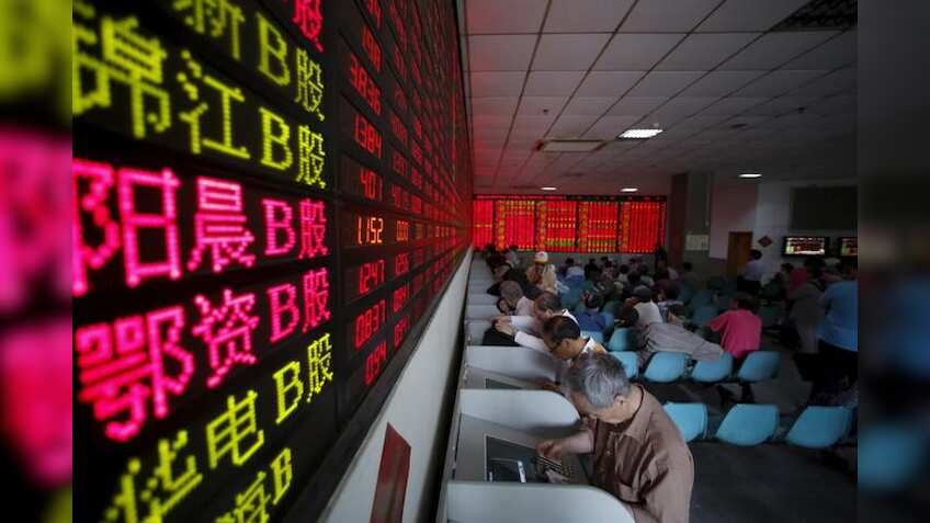 Global Markets: Asian shares near record high, dollar weak as job, wage data awaited