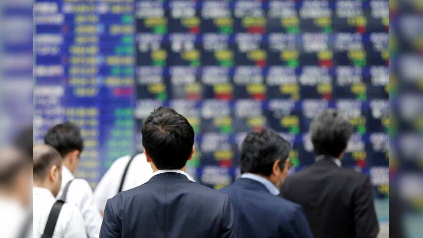 Global Markets: BoJ's tweak buoys yen, stocks rally rumbles on