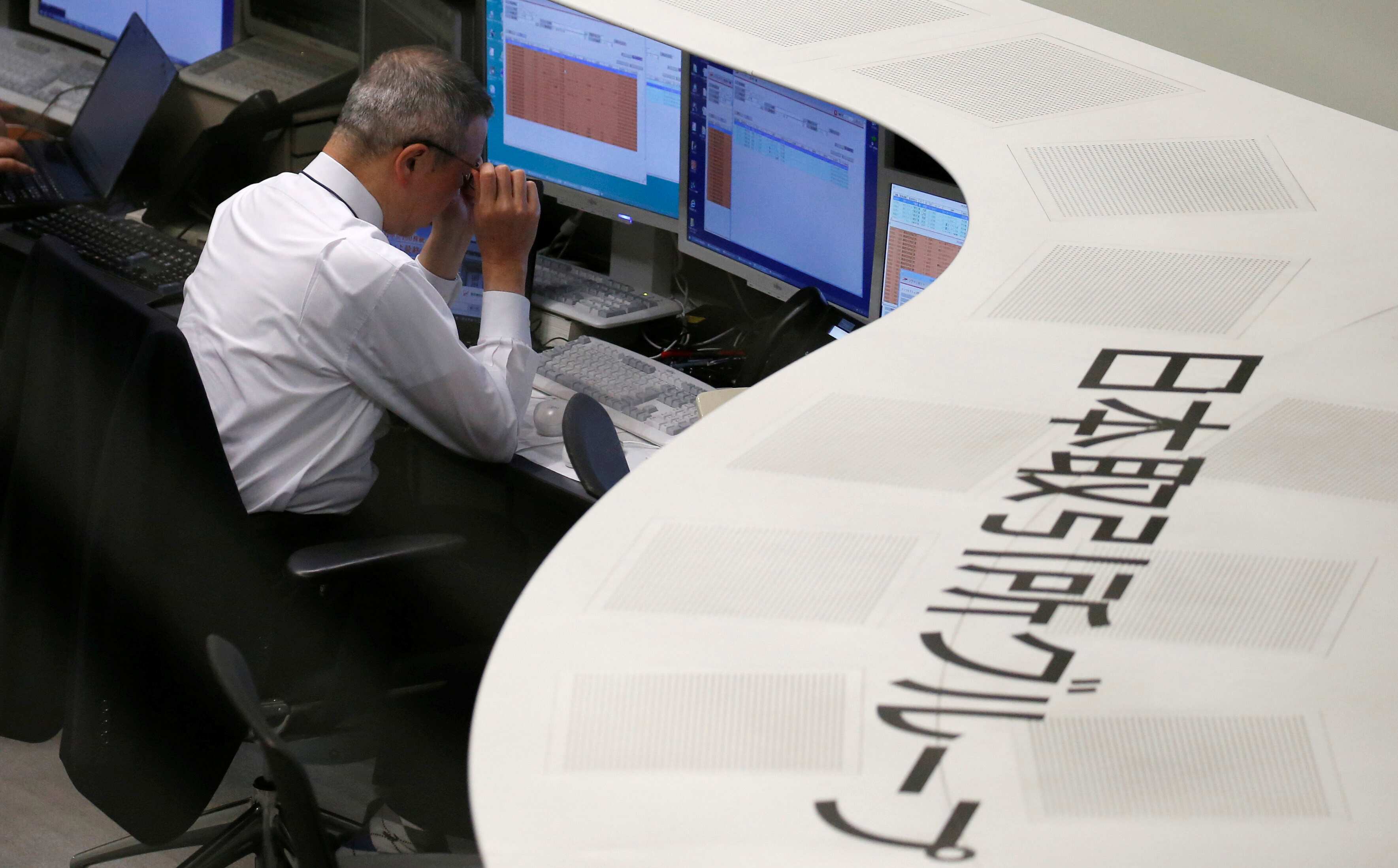 Asian shares slip as iron ore softens, euro near three-year top