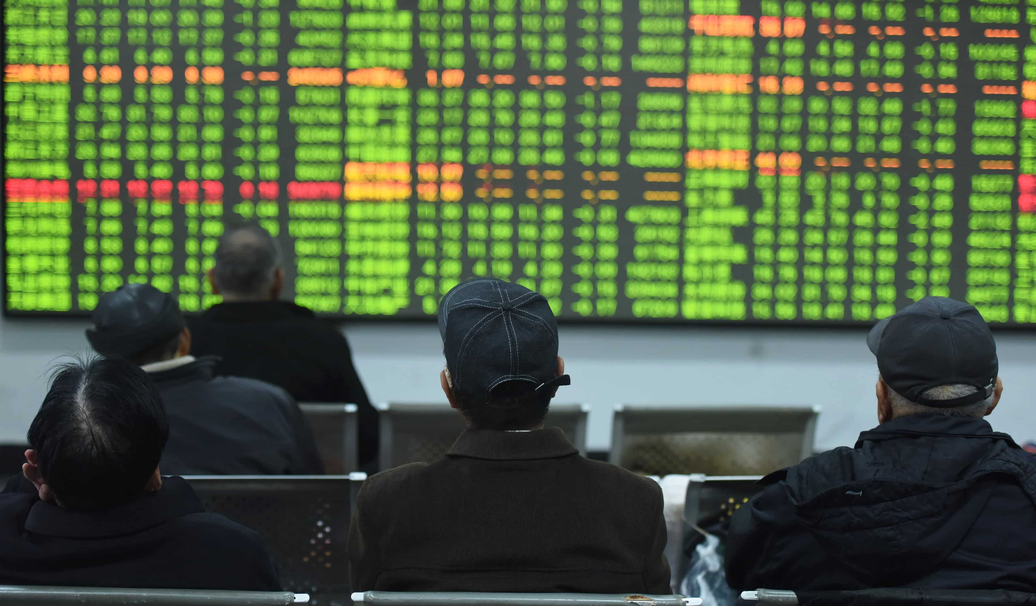 Nikkei closes at 26-year high on yen's softer tone