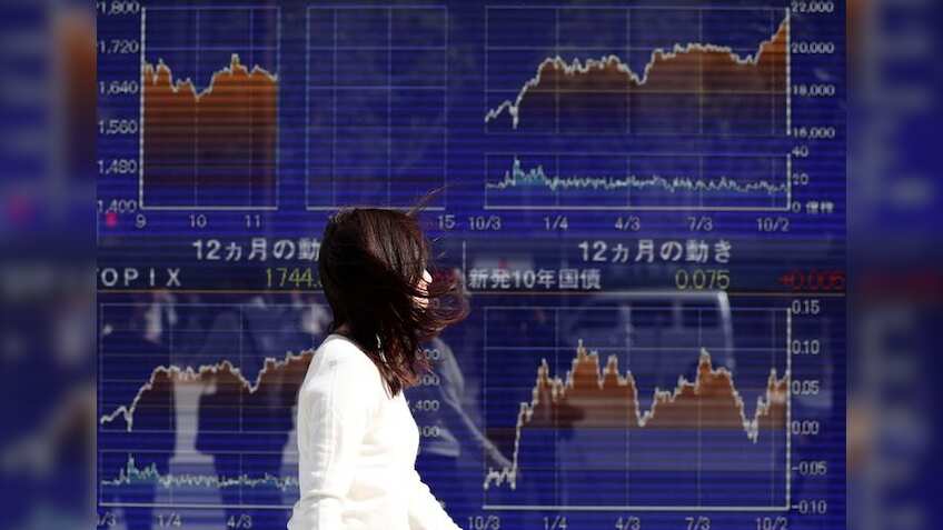 Global Markets: Asian shares dip as commodities ease, bitcoin licks wounds