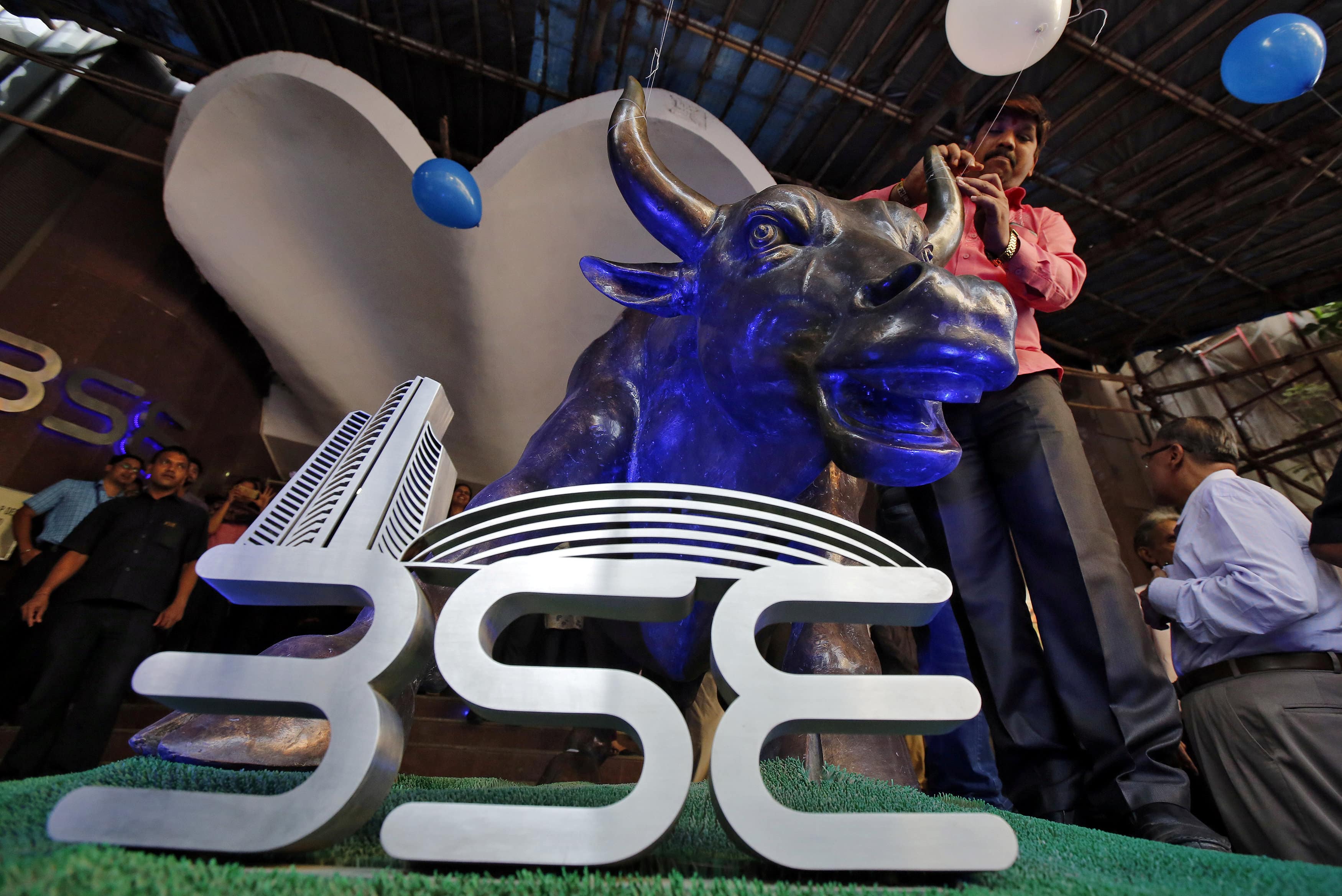Markets pare gains, but clock closing highs; Nifty holds above 10,800