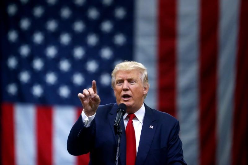 Trump to tout US economy, urge fair trade at elite Davos forum