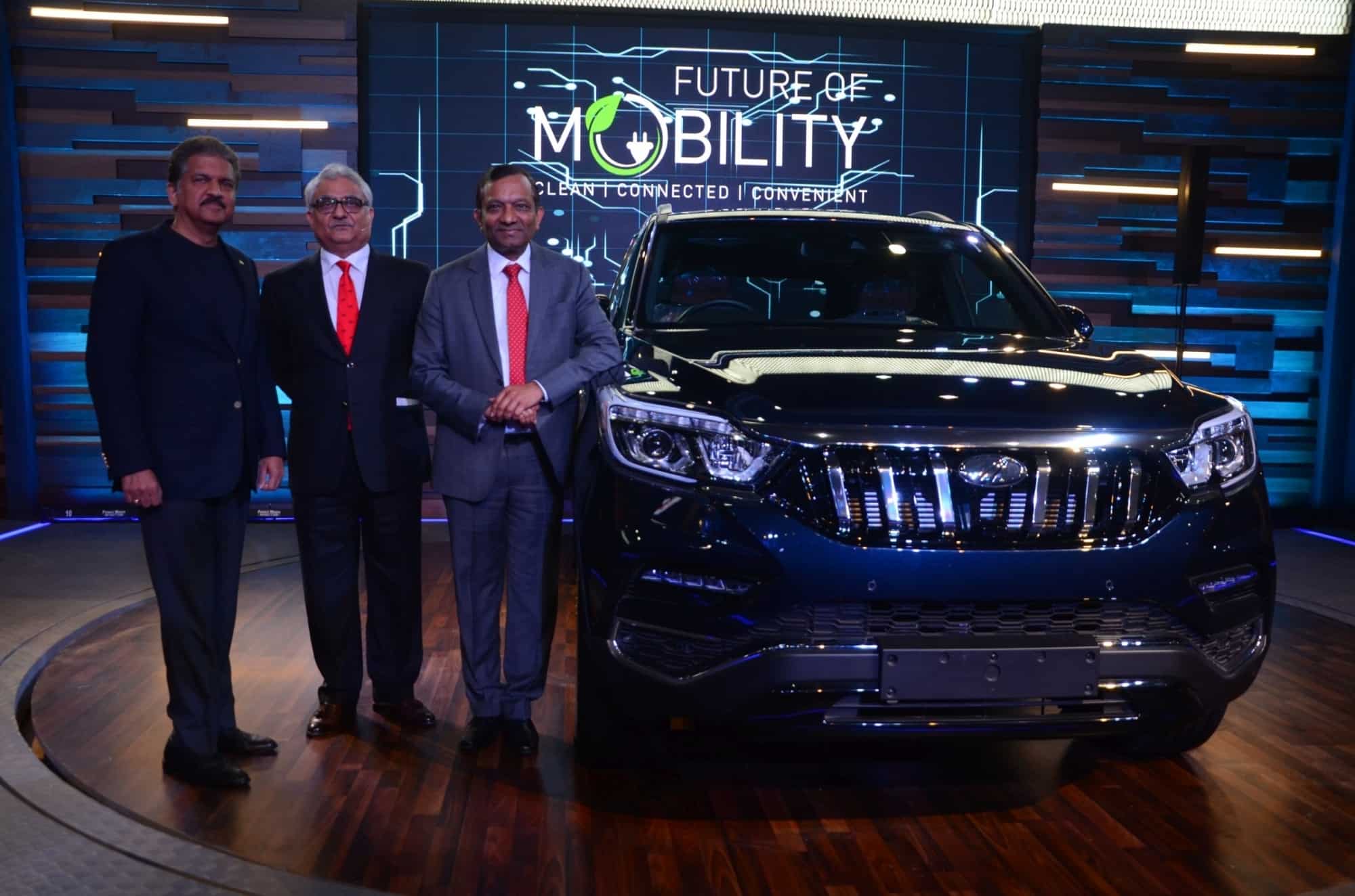 Mahindra Group Executive Chairman Anand Mahindra, Mahindra and Mahindra Ltd Automotive Sector president Rajan Wadhera and MD Pawan Goenka unveil the Mahindra XUV500 at the Auto Expo 2018 in New Delhi on Feb 7, 2018. IANS
