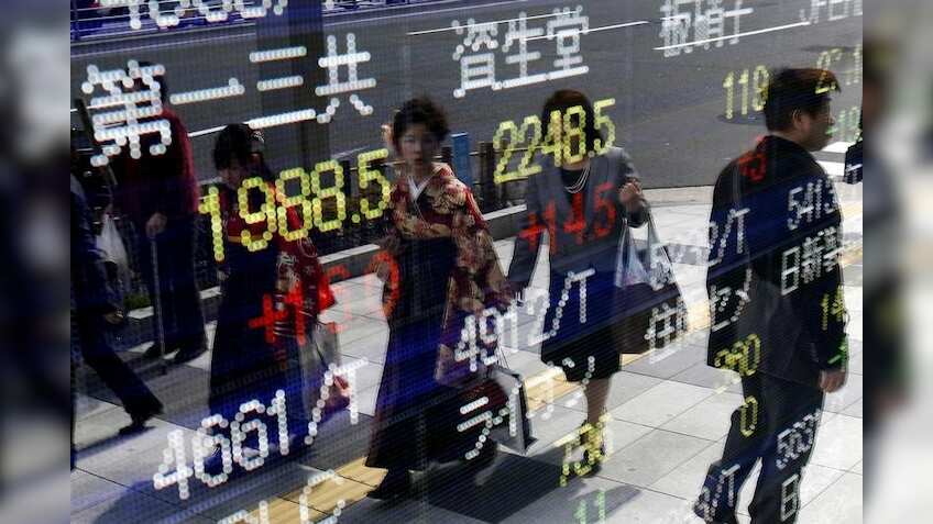 Asian markets, dollar under pressure ahead of US inflation data