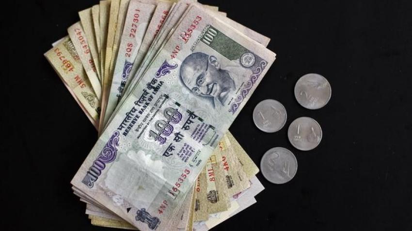 Rupee breaks below 65 vs dollar, hits 4-month low