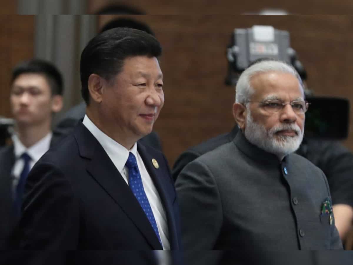 Narendra Modi, Xi Jinping talk; pledge more cooperation