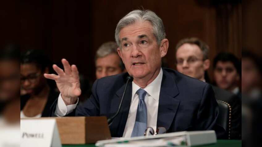 US Federal Reserve lifts rates, signals tougher stance as economy strengthens