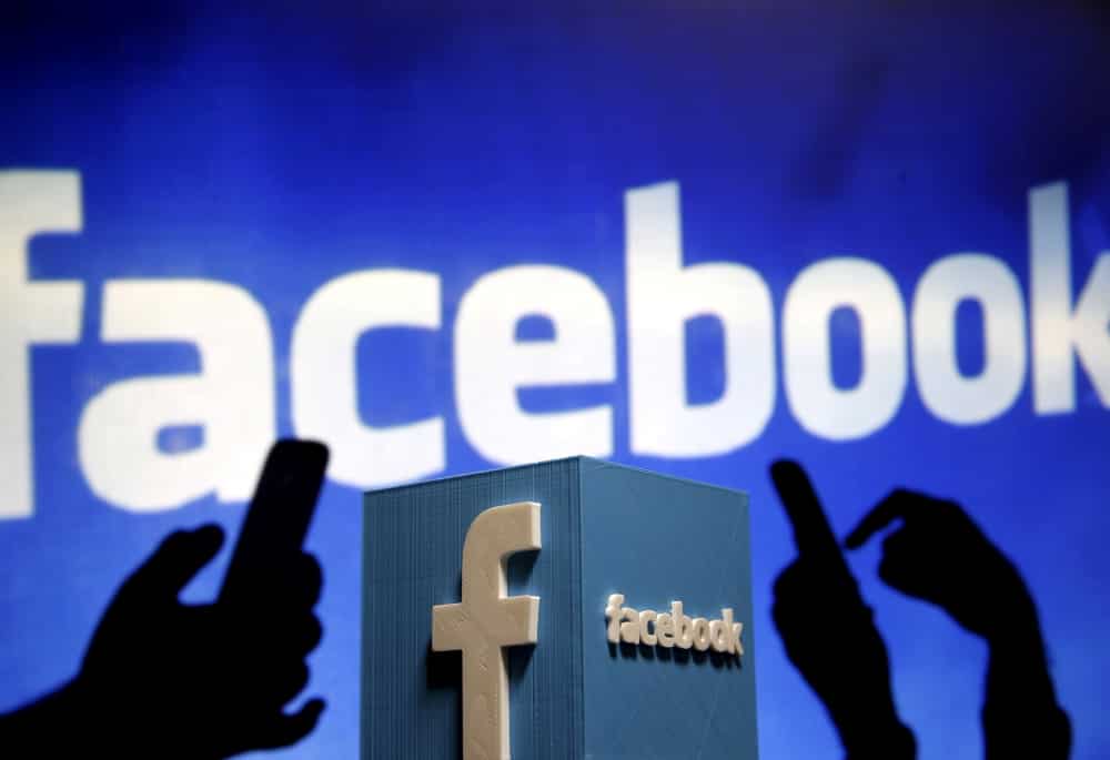 Facebook row: UK regulators search Cambridge Analytica offices