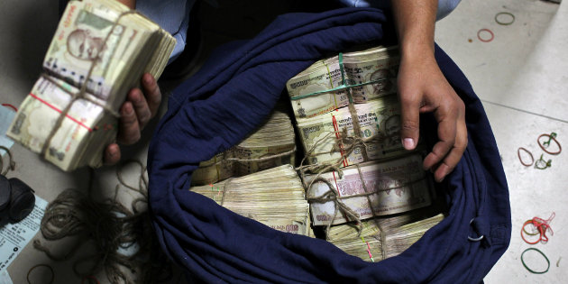 Black money crackdown: Aadhaar card to be deployed to catch corrupt government employees