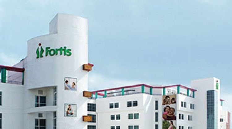 Clouds over hospital chain Fortis Healthcare keep suitors from making higher bids