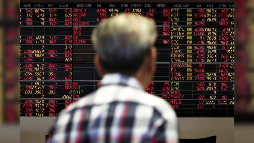 Asian markets steady, dollar near four-month high ahead of US Fed decision