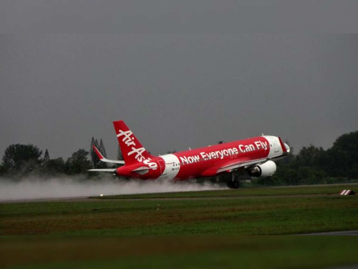 AirAsia shares tumble as probe threatens plans for
