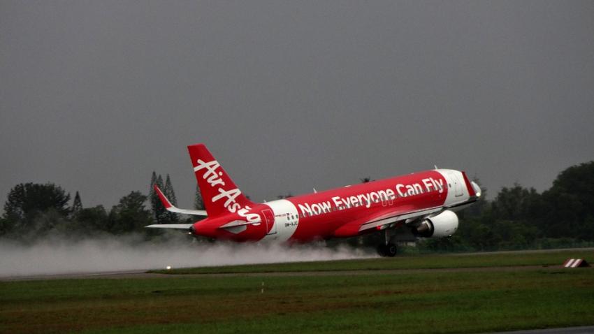 AirAsia shares tumble as probe threatens plans for