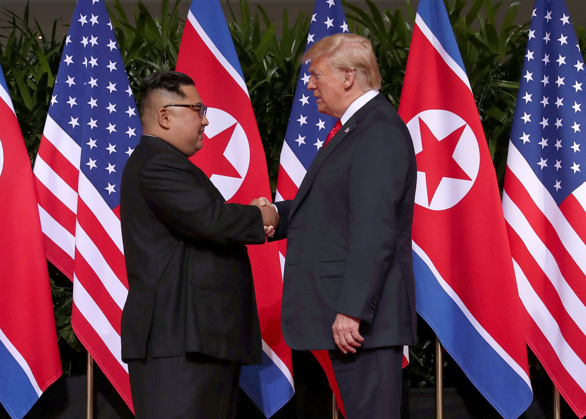 Donald Trump, Kim Jong-un sign 'comprehensive document' after historic summit
