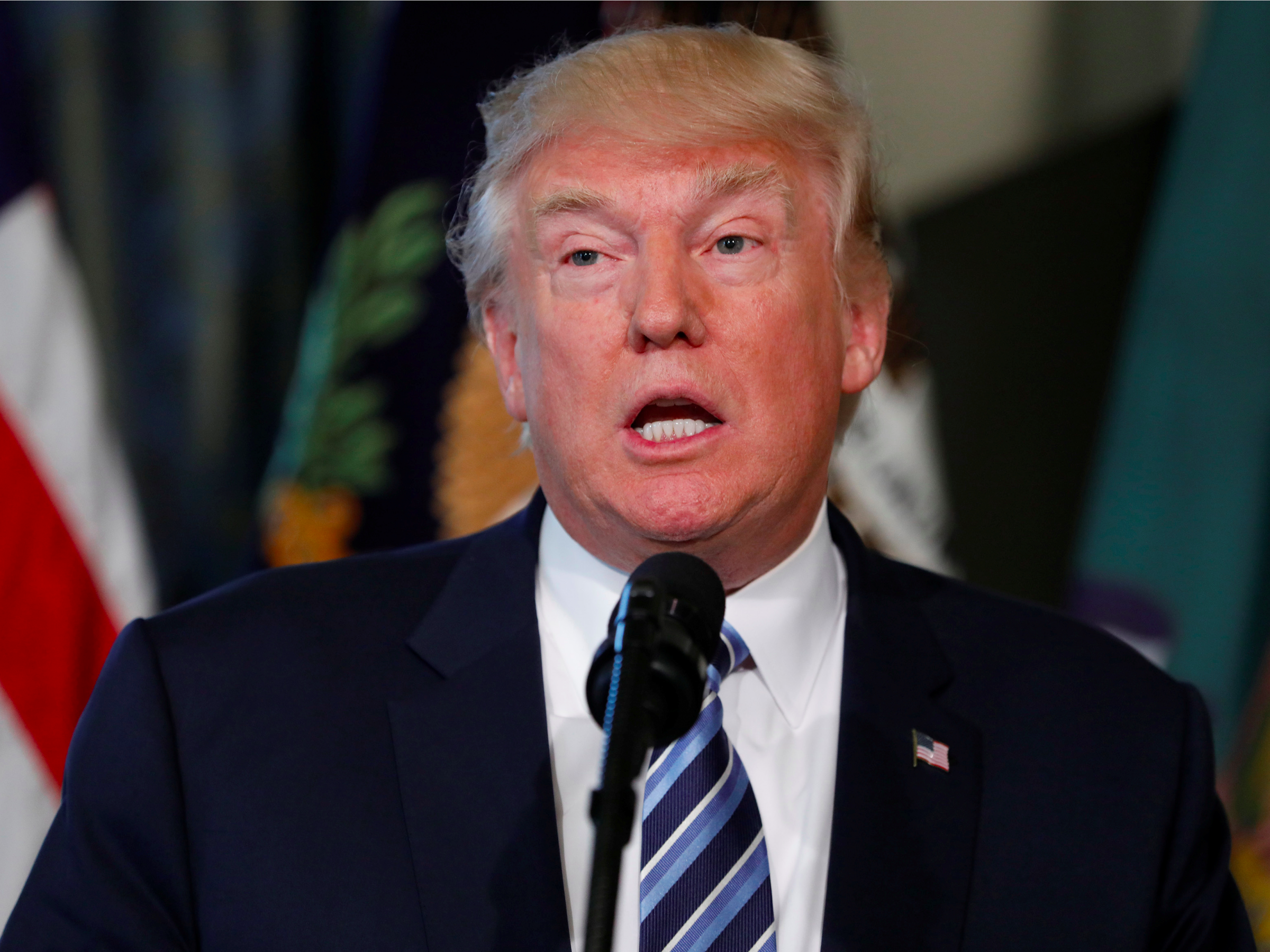 White House defends immigration policy as outrage grows over children