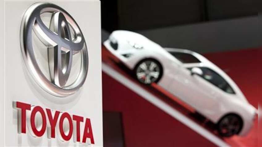 Toyota, pressed to innovate, is cutting marketing costs to fuel research