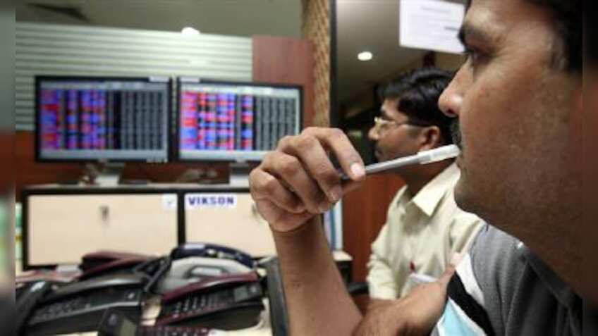 Sensex pares gains to slip in red, Nifty ends below 11,000; Kotak Mahindra Bank falls most
