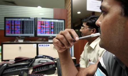 Sensex pares gains to slip in red, Nifty ends below 11,000; Kotak Mahindra Bank falls most