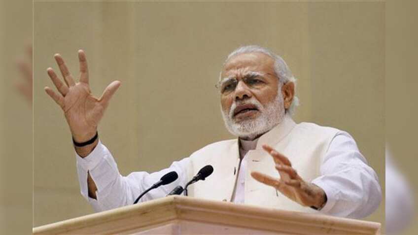 PM Narendra Modi says not afraid of being seen with industrialists, opposition hits back