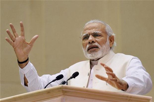 PM Narendra Modi says not afraid of being seen with industrialists, opposition hits back